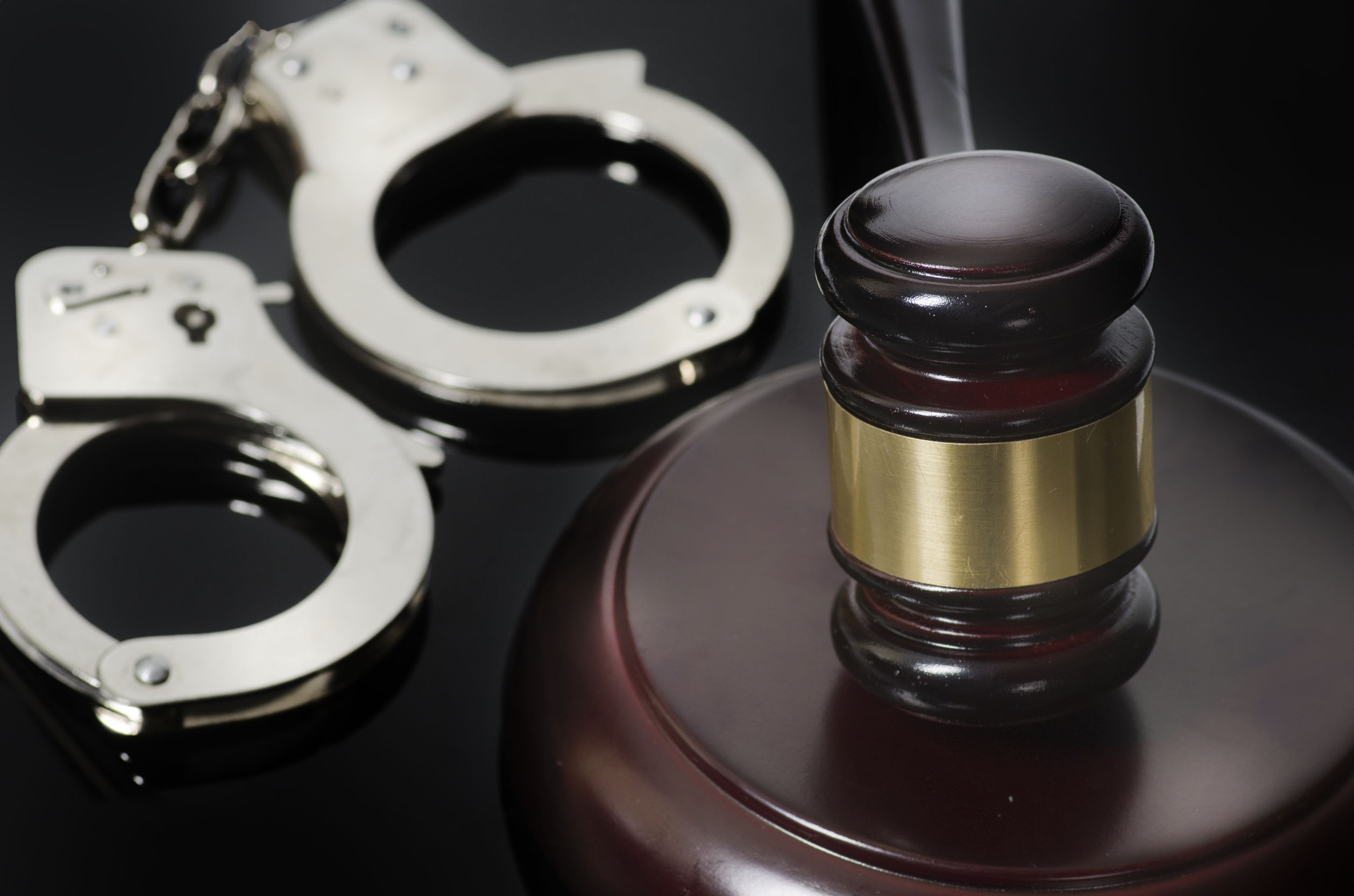 handcuffs and court gavel - bail bonds